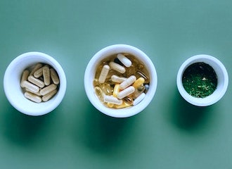 Three small containers with supplements